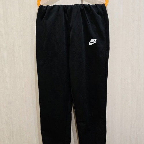 Nike kids' black tracksuit pants like new for ages 9-12