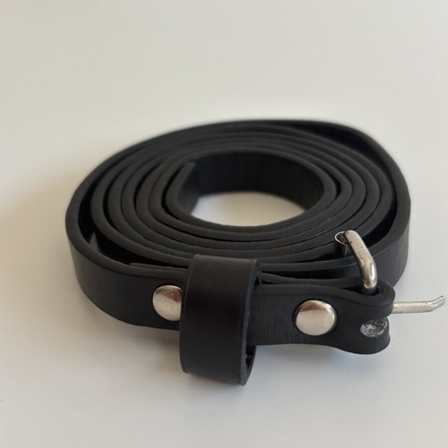 Black slim belt with silver buckle and studs, minimal style