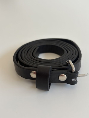 Black slim belt with silver buckle and studs, minimal style