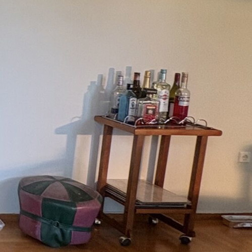 Brown sofa and green armchair furniture set