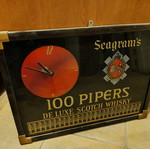 100 PIPERS wall clock like new, analog