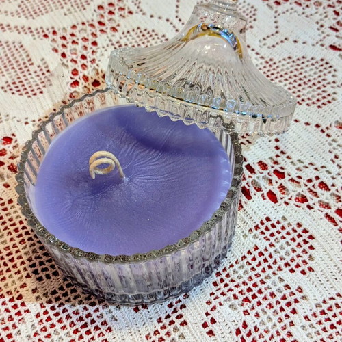 Scented candle in glass fondue pot, lavender aroma