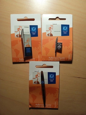 3 collectible pins with torches themed around the Athens 2004 Torch Relay