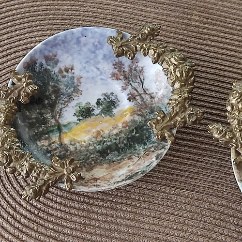 Andreas Zymatikas handpainted porcelain decorative plates, pair