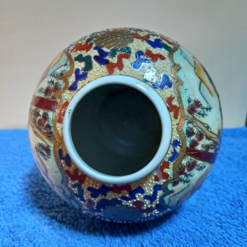 Satsuma vase used with handpainted floral motifs and crackle glaze