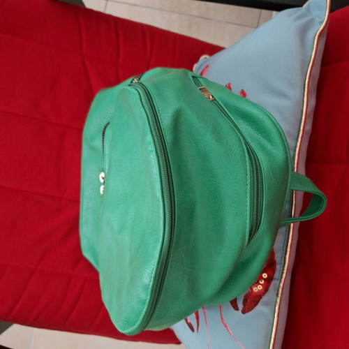 Green leather backpack new with spacious compartments