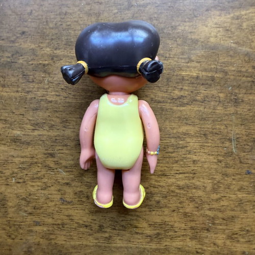 Dora the Explorer figure in yellow swimsuit used by Mattel and Viacom