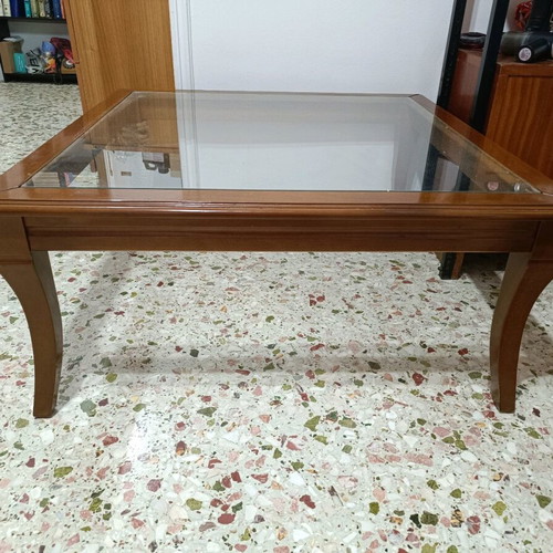 Solid wood coffee table with glass top like new