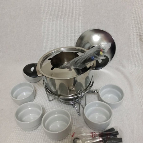 Fondue for melted cheese or chocolate new