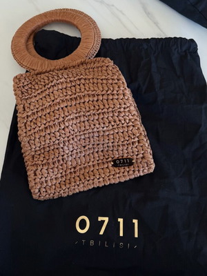 0711 brown raffia bag like new