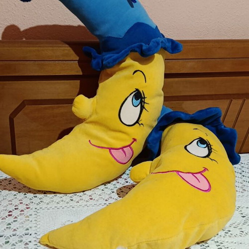 Set of 2 plush moon pillows used for kids' room decor