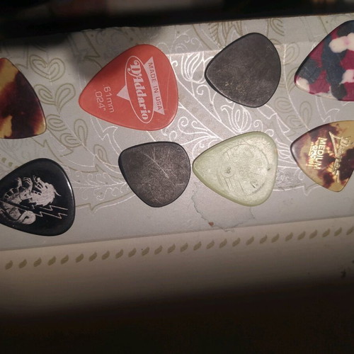 Used guitar picks for string instruments