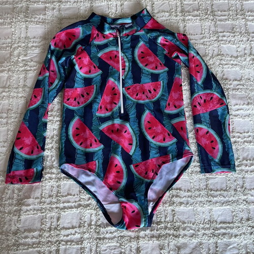 Girls' swimsuit with long sleeves like new, sun protection, size 7-8 years