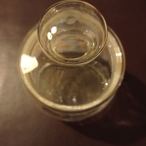 Glass kitchen jars like new, 1 small and 1 large