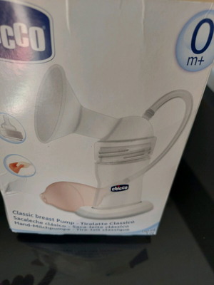 Chicco breast pump new, unopened in nylon