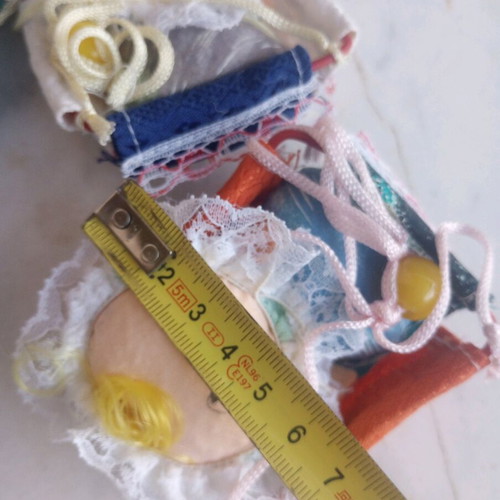 Seven cloth baby dolls in cradle new