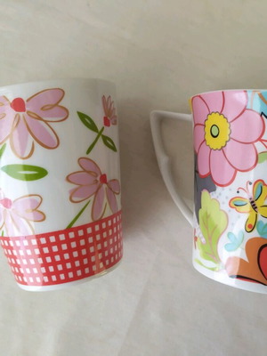 Porcelain mugs used, set of 2 with colorful cheerful designs