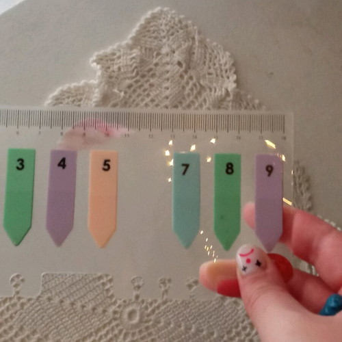Multicolored pastel bookmarks used