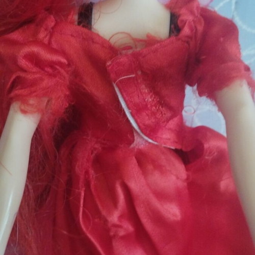 Barbie Colour Reveal doll with red dress