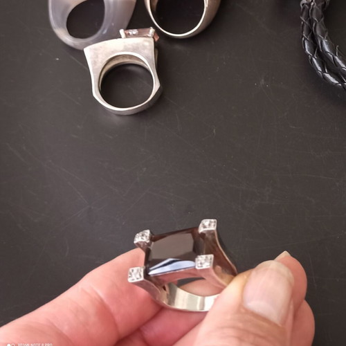 Silver ring with dark brown stone used