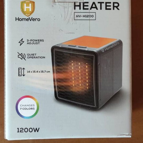 HomeVero HV-H1200 heater like new with 3 power levels and decorative light