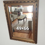 Mirror with wooden frame