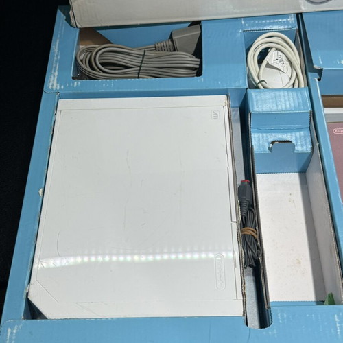 Nintendo Wii console used, boxed with black controller