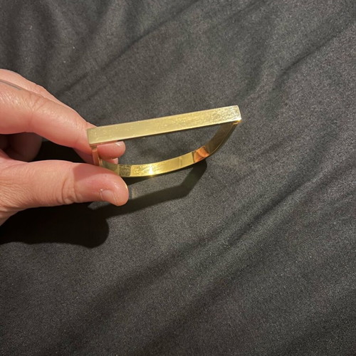 Gold-plated unisex hand bracelet like new, gold color