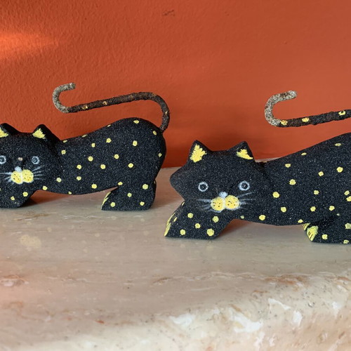 Set of two handmade wooden and sand cat figurines