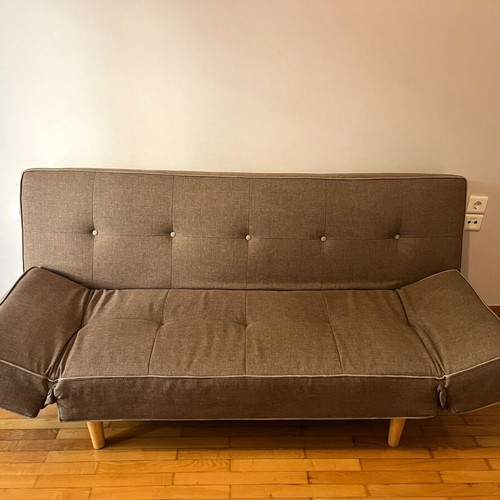 Three-seater sofa bed with left arm defect