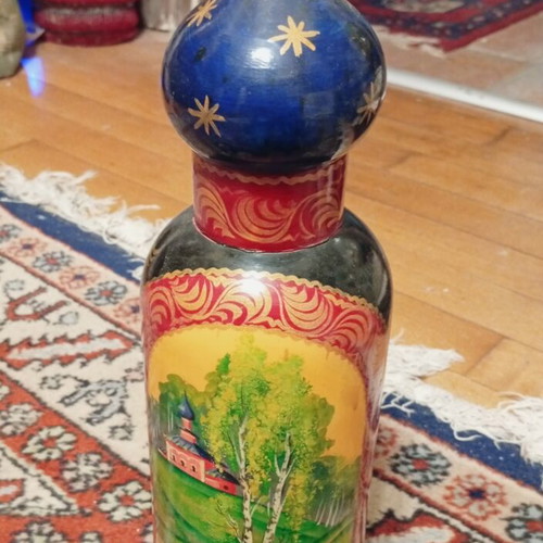 Old Russian wooden bottle case with hand-painted traditional folk art