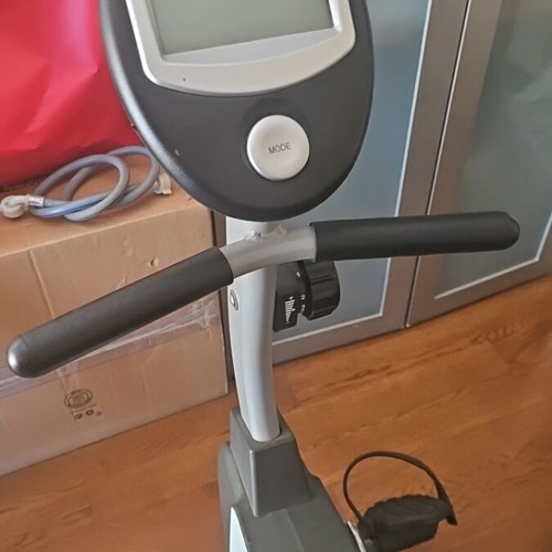 X-Fit stationary bike used with time and calorie counter