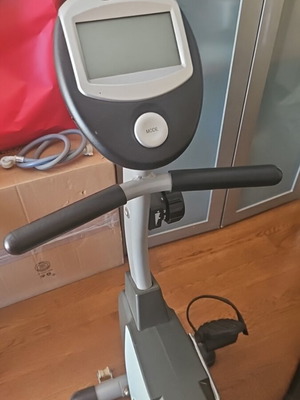 X-Fit stationary bike used with time and calorie counter