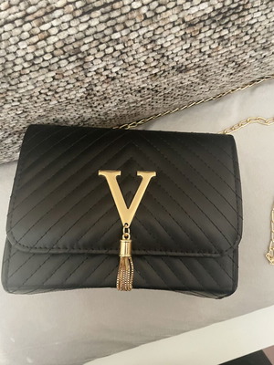 Bag new black chevron quilted with gold chain and V detail