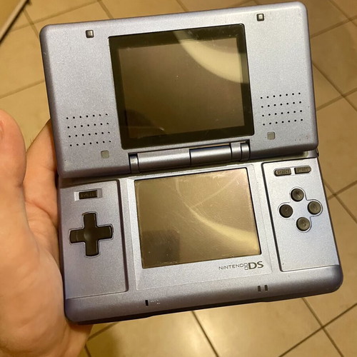 Nintendo DS Fat console with charger and stylus