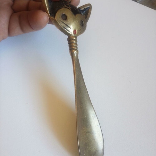 Vintage brass bone shoehorn with cat design, 17 cm