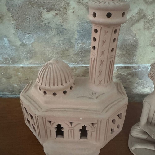 African clay decorative set with figure and palace