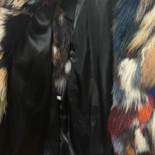 Multicolored sleeveless fur like new