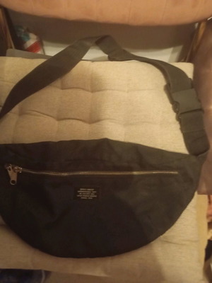 Waist bag like new, black, with broken zipper