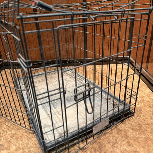 Metal Pet Crate used, durable for medium-sized dogs