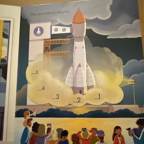 Usborne Peep Inside How a Rocket Works book like new in English