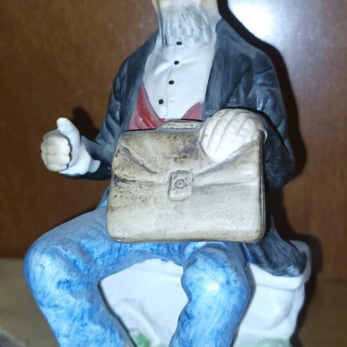 Vintage decorative figurine like new with seated old man