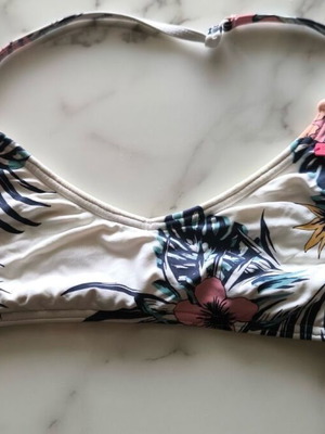 Roxy strapless bikini top like new, 14 years, white multicolor