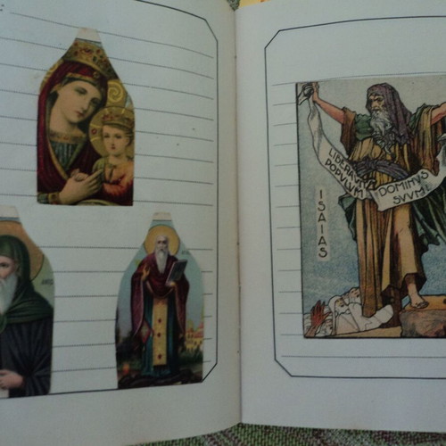 Album with over 50 used religious chromolithograph cards