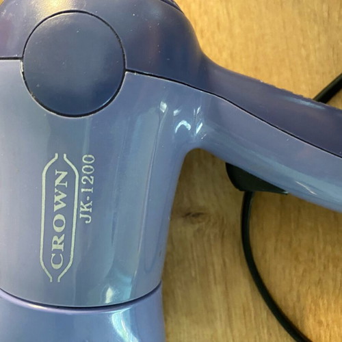 Travel hair dryer used, small, mauve color