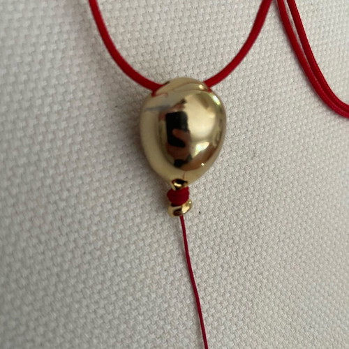 Kessaris necklace used with gold-plated balloon-shaped pendant