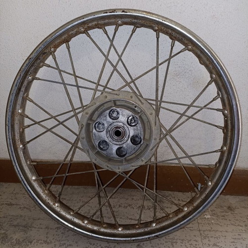 Motorcycle rim used, old with surface rust and missing spoke