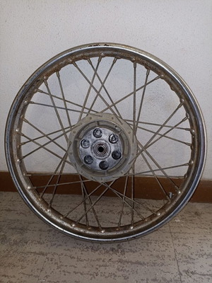 Motorcycle rim used, old with surface rust and missing spoke