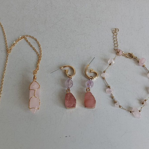Jewelry set with rose quartz and gold-tone metal elements