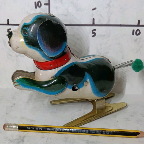 Tin vintage wind-up dog like new, height 12 cm